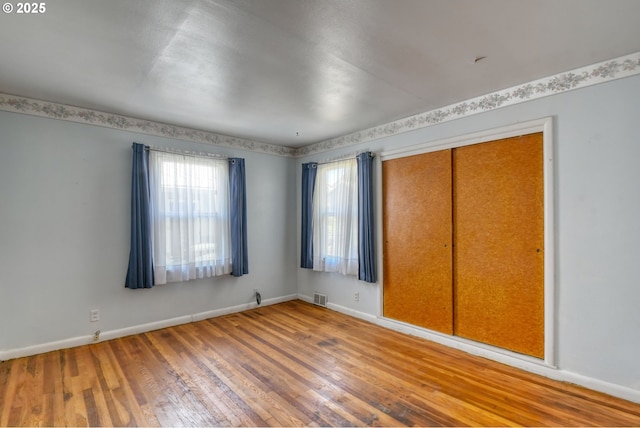 104 NW 12th St, Pendleton, OR 97801 - empty room with wood finished floors and baseboards