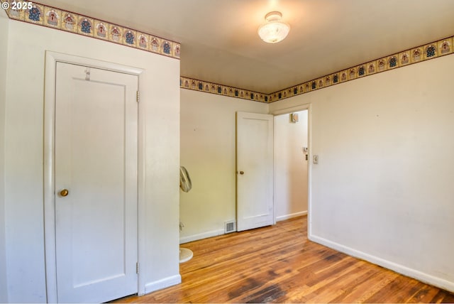104 NW 12th St, Pendleton, OR 97801 - unfurnished bedroom with baseboards and wood finished floors