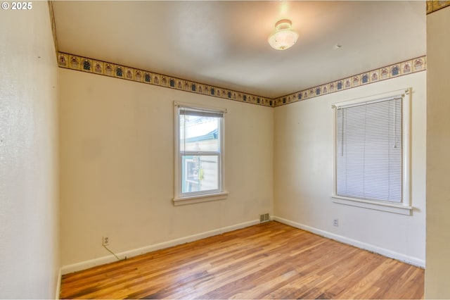 104 NW 12th St, Pendleton, OR 97801 - spare room featuring wood finished floors and baseboards