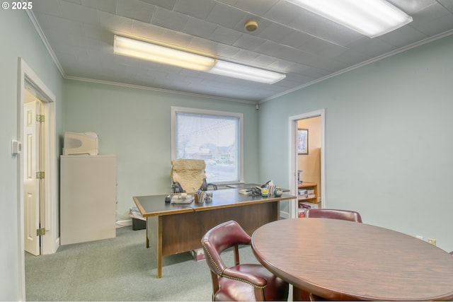 home office featuring crown molding and light colored carpet