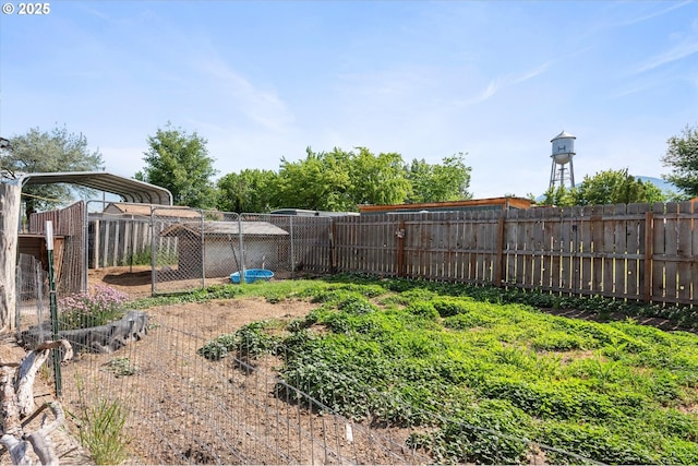view of yard featuring a carport