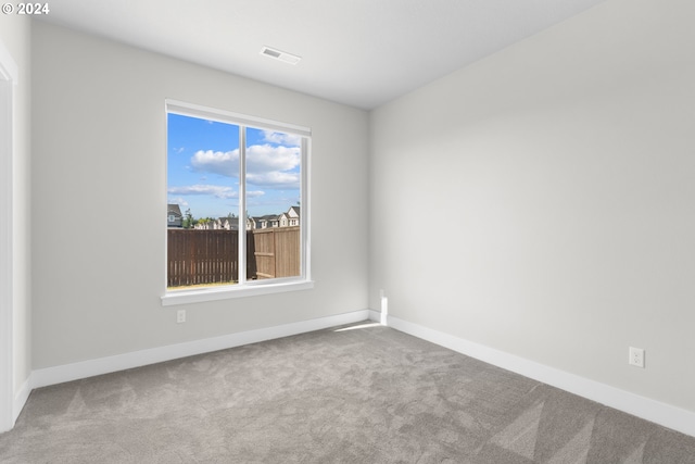 empty room with light carpet