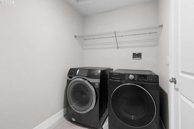 laundry area featuring independent washer and dryer