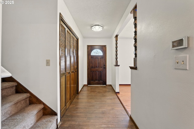 18735 NE Wasco Ct, Portland, OR 97230 - entrance foyer with wood-type flooring, stairs, and baseboards