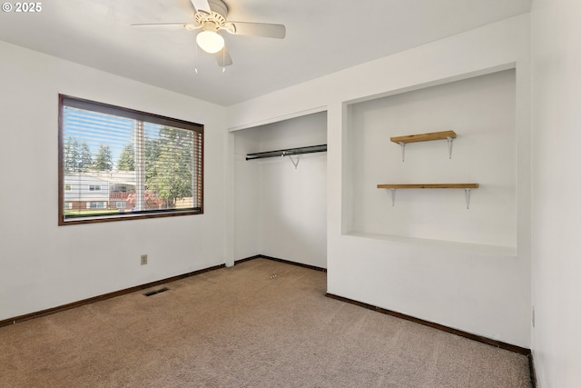 18735 NE Wasco Ct, Portland, OR 97230 - unfurnished bedroom featuring carpet, a closet, baseboards, and a ceiling fan