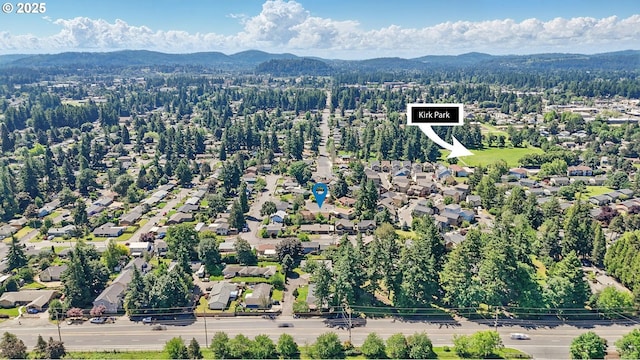 18735 NE Wasco Ct, Portland, OR 97230 - aerial view of property's location featuring a mountain backdrop and a forest