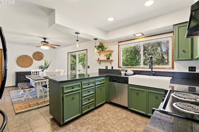 18735 NE Wasco Ct, Portland, OR 97230 - kitchen featuring green cabinetry, stainless steel dishwasher, a sink, black / electric stove, and dark countertops