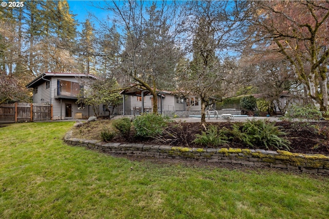 view of yard featuring fence