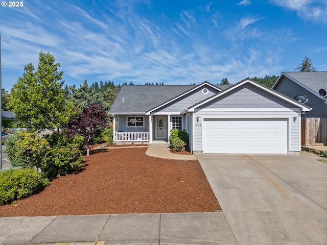 1894 S 8th St, Cottage Grove, OR 97424 - single story home featuring a garage, covered porch, and concrete driveway