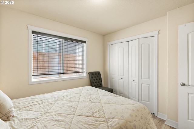 1894 S 8th St, Cottage Grove, OR 97424 - bedroom featuring wood finished floors and a closet