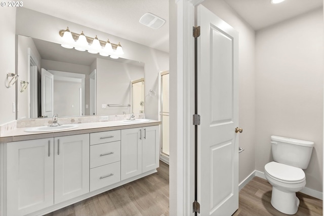 3020 S Kodiak St Unit Lt811, Cornelius, OR 97113 - bathroom with wood finished floors, double vanity, and a stall shower