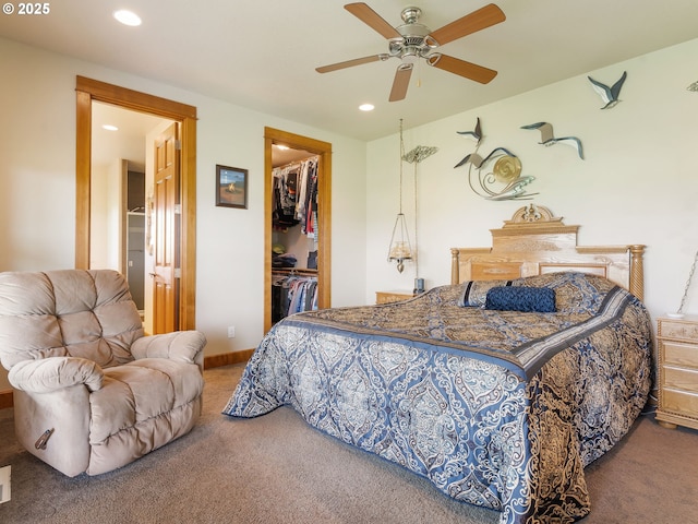 carpeted bedroom featuring a ceiling fan, a closet, recessed lighting, and a spacious closet