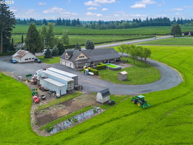 birds eye view of property featuring a rural view