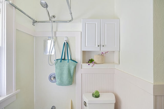 7228 N Villard Ave, Portland, OR 97217 - bathroom with a wainscoted wall and a shower