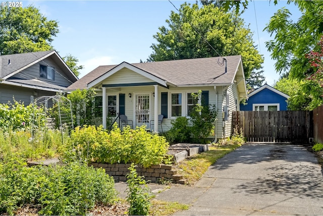 7228 N Villard Ave, Portland, OR 97217 - view of front of property featuring driveway and roof with shingles