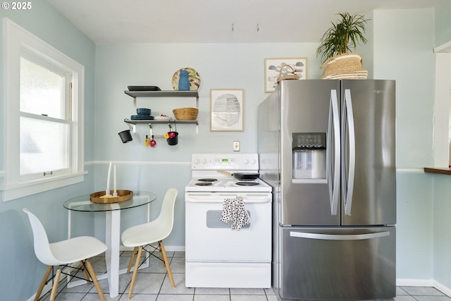 7228 N Villard Ave, Portland, OR 97217 - kitchen featuring stainless steel refrigerator with ice dispenser, white electric stove, light tile patterned floors, and open shelves