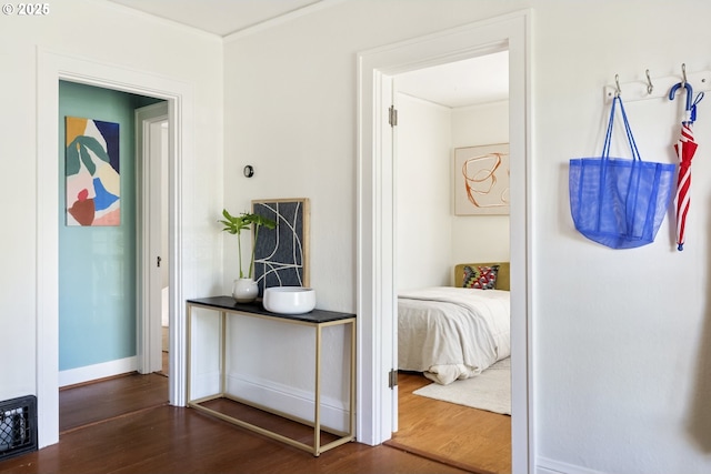 7228 N Villard Ave, Portland, OR 97217 - hall with dark wood-style flooring and crown molding