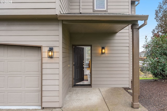 entrance to property featuring a garage