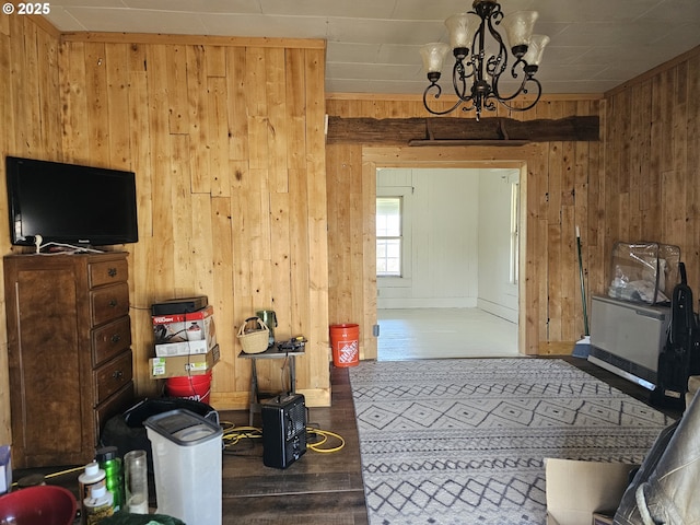 54901 Willow St, Heppner, OR 97836 - living room featuring wooden walls, wood finished floors, and a chandelier