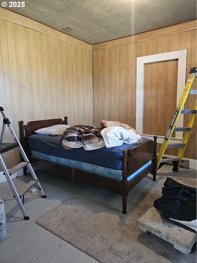 54901 Willow St, Heppner, OR 97836 - bedroom with wooden walls and wood finished floors