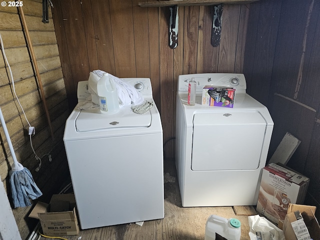 54901 Willow St, Heppner, OR 97836 - washroom with washing machine and dryer and wood walls