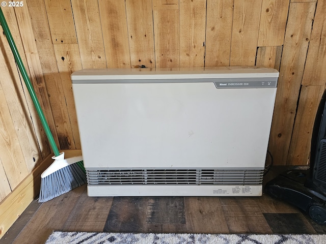 54901 Willow St, Heppner, OR 97836 - detailed view of heating unit, wood finished floors, and wooden walls