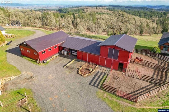 bird's eye view with a forest view