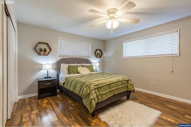 bedroom with ceiling fan, a closet, baseboards, and wood finished floors