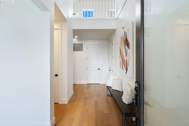 310 W Fir Loop, Washougal, WA 98671 - hallway with light wood finished floors, baseboards, and a high ceiling