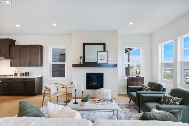 310 W Fir Loop, Washougal, WA 98671 - living room featuring light wood-style floors, recessed lighting, and a fireplace
