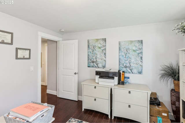 office with baseboards and dark wood-style flooring