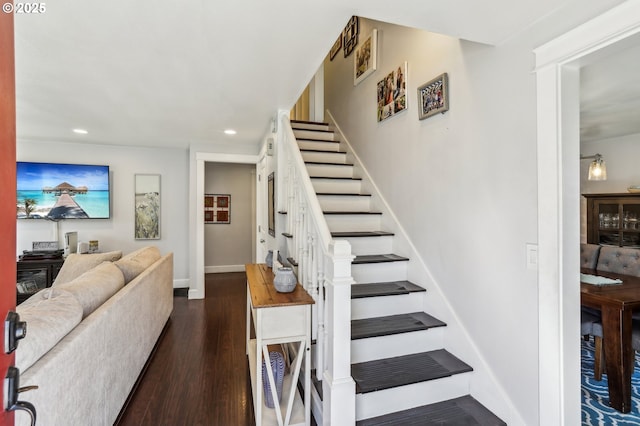 stairs with recessed lighting, wood finished floors, and baseboards