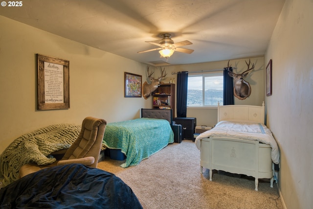 bedroom with carpet and a ceiling fan