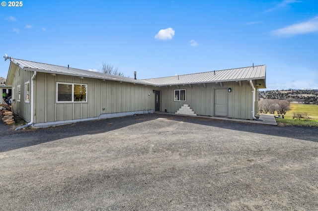 view of front of property with metal roof and board and batten siding