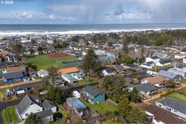 aerial view with a residential view and a water view