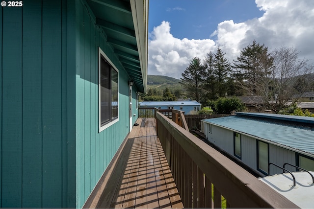 balcony featuring a mountain view