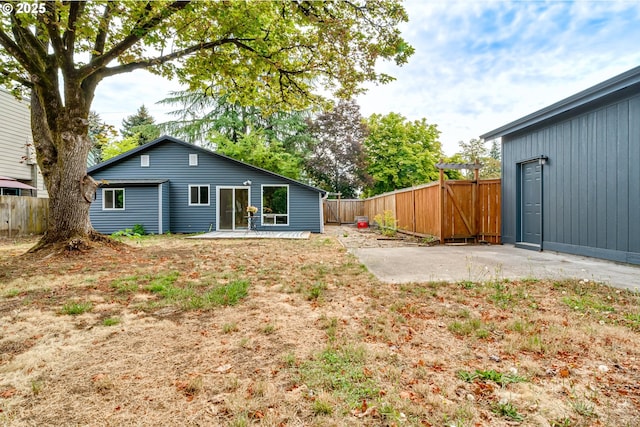 284 Waite St, Eugene, OR 97402 - back of property featuring a patio area and a fenced backyard