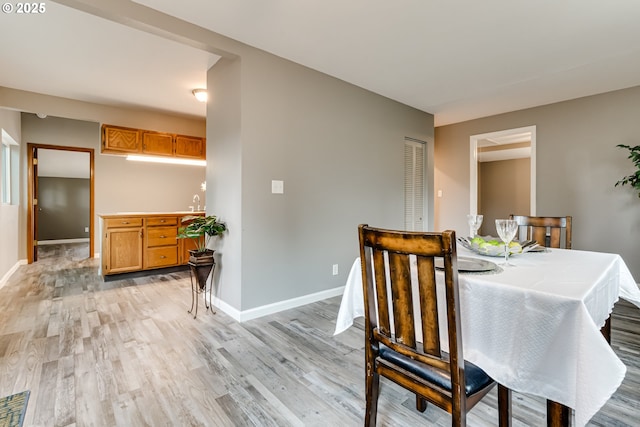 284 Waite St, Eugene, OR 97402 - dining area with light wood-style flooring and baseboards