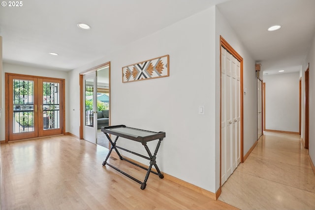 8895 SW Bohmann Pkwy, Portland, OR 97223 - corridor featuring french doors, recessed lighting, baseboards, and light wood-style flooring