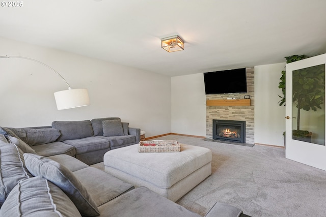 8895 SW Bohmann Pkwy, Portland, OR 97223 - carpeted living room with a tile fireplace and baseboards