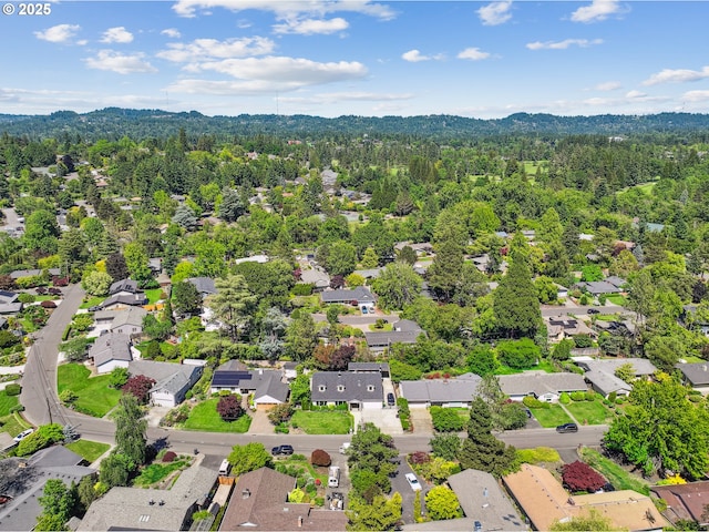 8895 SW Bohmann Pkwy, Portland, OR 97223 - aerial perspective of suburban area featuring a heavily wooded area and mountains