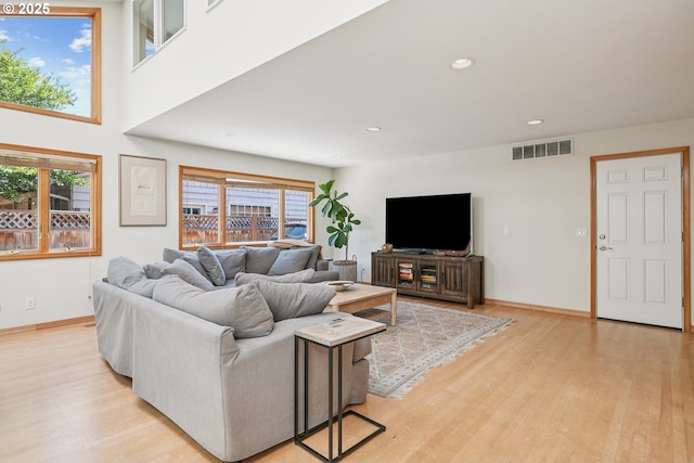 8895 SW Bohmann Pkwy, Portland, OR 97223 - living room with light wood-type flooring, baseboards, and recessed lighting