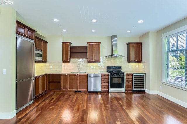 kitchen featuring wall chimney range hood, built in appliances, beverage cooler, open shelves, and dark wood-style flooring
