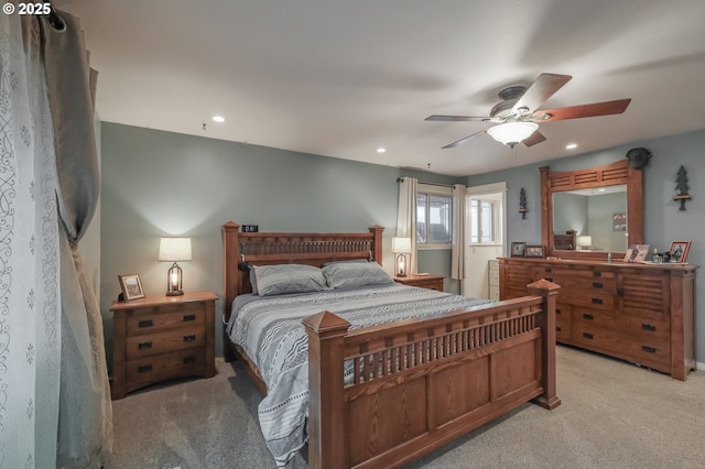 bedroom with light carpet, recessed lighting, and ceiling fan