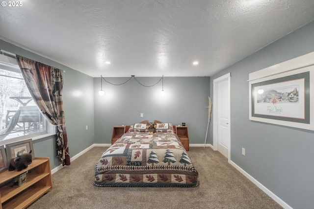 carpeted bedroom with a textured ceiling, baseboards, and recessed lighting