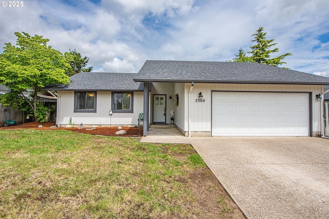 3308 Honeywood St, Eugene, OR 97408 - ranch-style home featuring concrete driveway, a garage, a shingled roof, and a front lawn