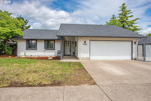 3308 Honeywood St, Eugene, OR 97408 - view of front facade with concrete driveway, a garage, and a shingled roof