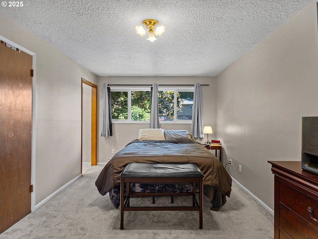 3311 SE 1st St, Gresham, OR 97080 - bedroom with carpet flooring, a textured ceiling, and baseboards