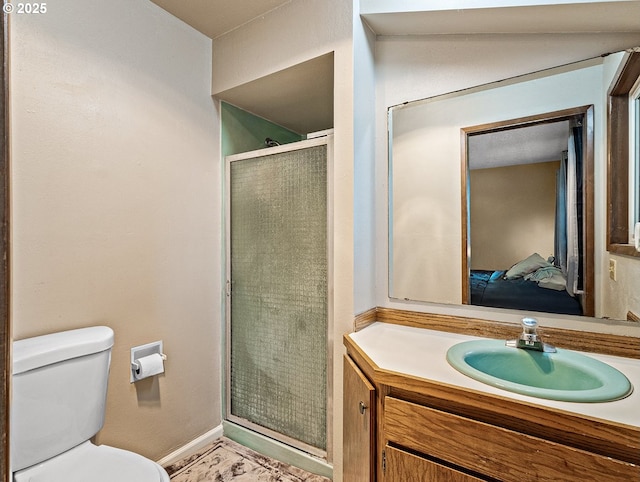 3311 SE 1st St, Gresham, OR 97080 - bathroom with connected bathroom, a stall shower, vanity, toilet, and baseboards