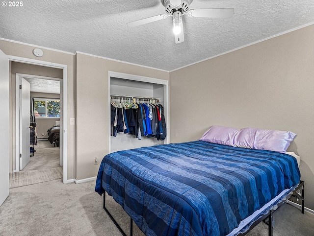 3311 SE 1st St, Gresham, OR 97080 - carpeted bedroom featuring a textured ceiling, a closet, crown molding, ceiling fan, and baseboards